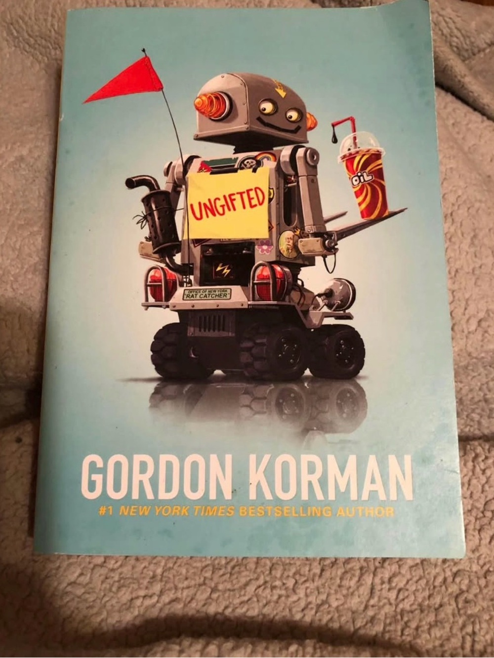 Scholastic Light Blue Book Back with Red Triangle Accent